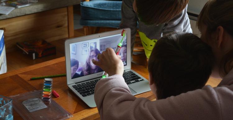 People looking at a computer screen