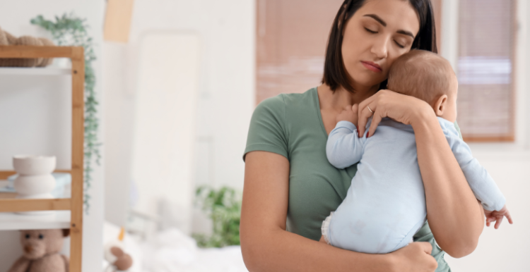 Mother holding baby in her arms