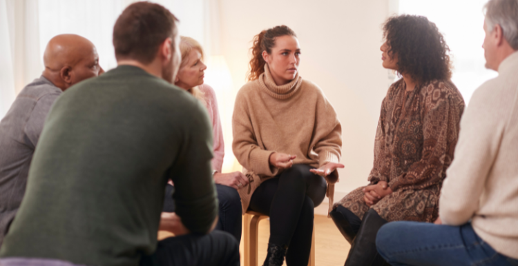 Group of people talking during therapy