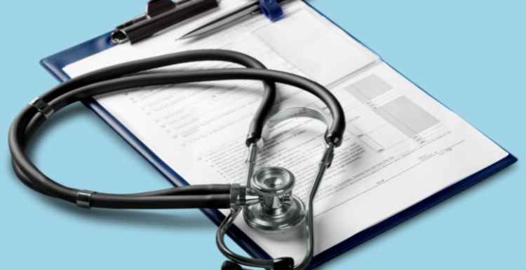 Picture of a clipboard and stethoscope placed on it.