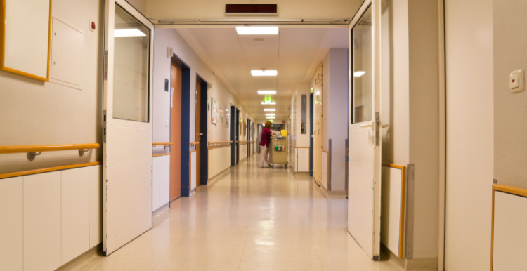 An empty hospital corridor.