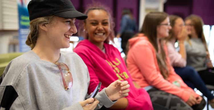 Group of young volunteers smiling at the camera