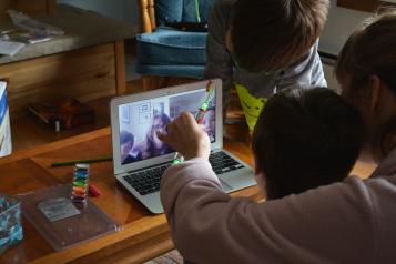 People looking at a computer screen