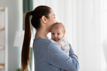 Mother holding baby in her arms