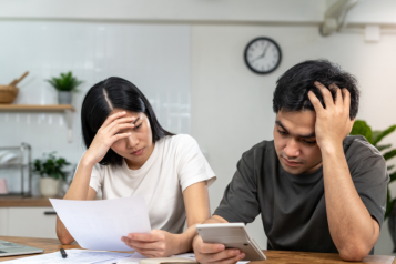 Man and woman stressed