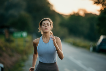 Woman running on the road