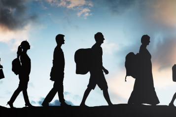silhouette of people walking 