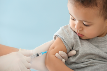 Picture of a baby receiving a vaccine.