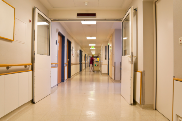 An empty hospital corridor.